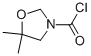 3-Oxazolidinecarbonylchloride, 5,5-dimethyl-